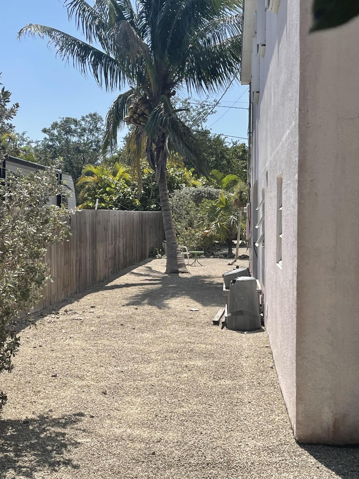 Undisclosed Address Big Pine Key, FL 33043 - Photo 24 of 28 a view of a backyard of a house