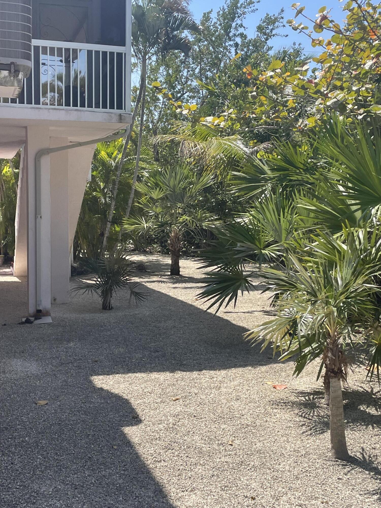 Undisclosed Address Big Pine Key, FL 33043 - Photo 26 of 28 a view of a street front of house