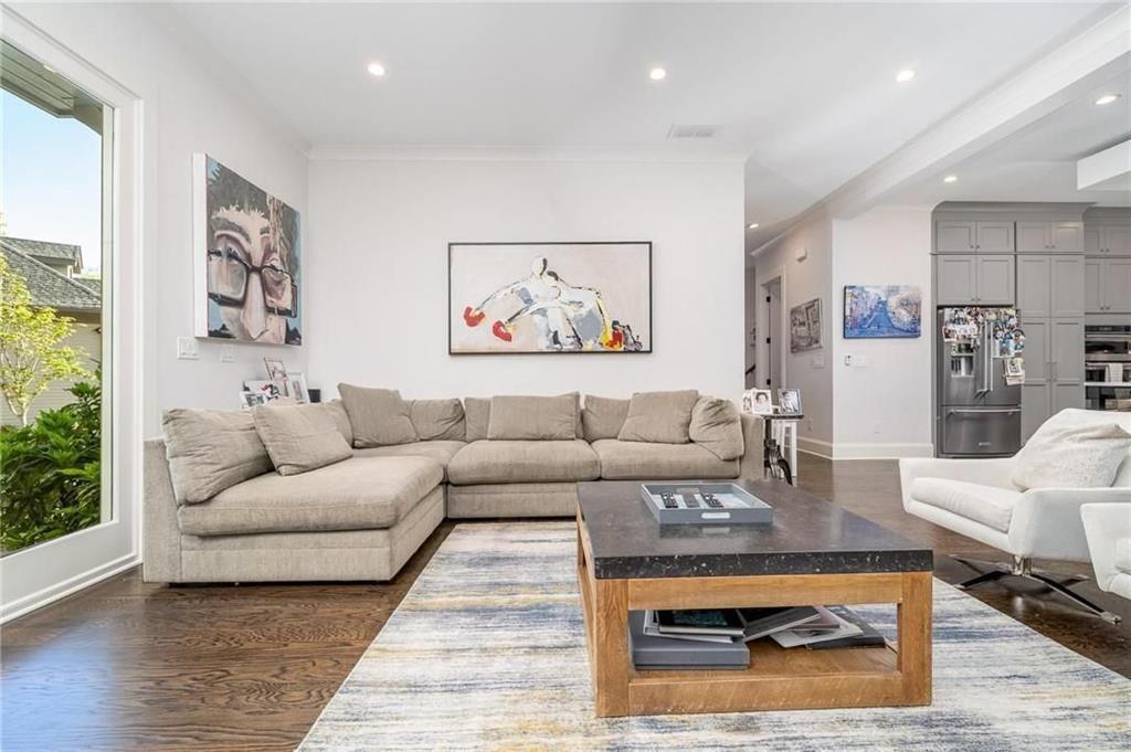 216 Haralson Lane Atlanta, GA 30307 - Photo 17 of 33 a living room with furniture a rug and a large window
