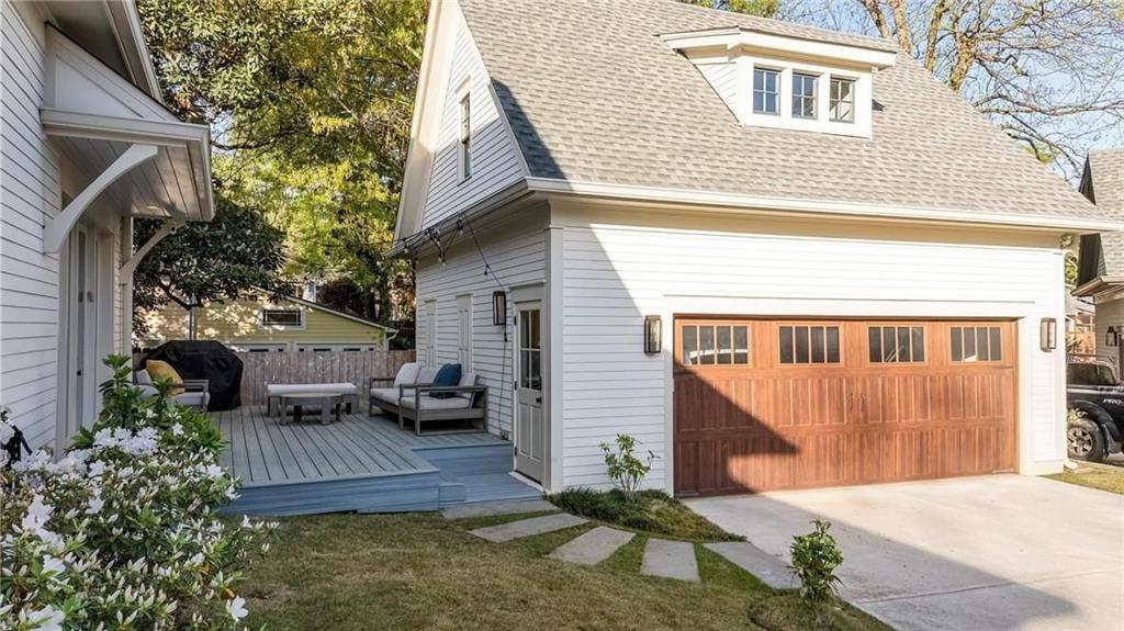 216 Haralson Lane Atlanta, GA 30307 - Photo 24 of 33 a view of a house with a patio