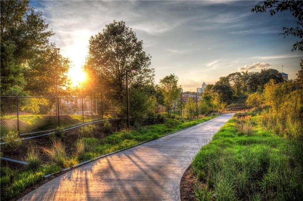 216 Haralson Lane Atlanta, GA 30307 - Photo 33 of 33 a view of a pathway both side of building