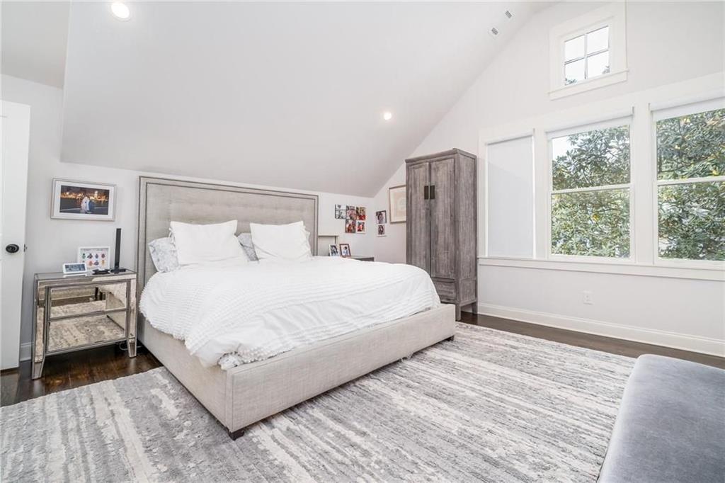 216 Haralson Lane Atlanta, GA 30307 - Photo 5 of 33 a bedroom with a large bed and a window