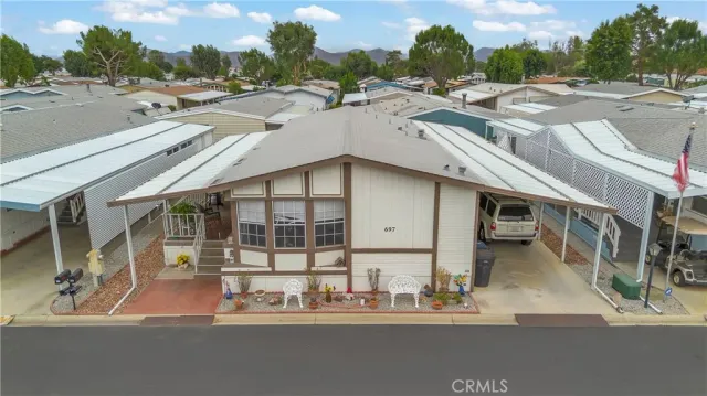 a view of a house with a sink and floor to ceiling window