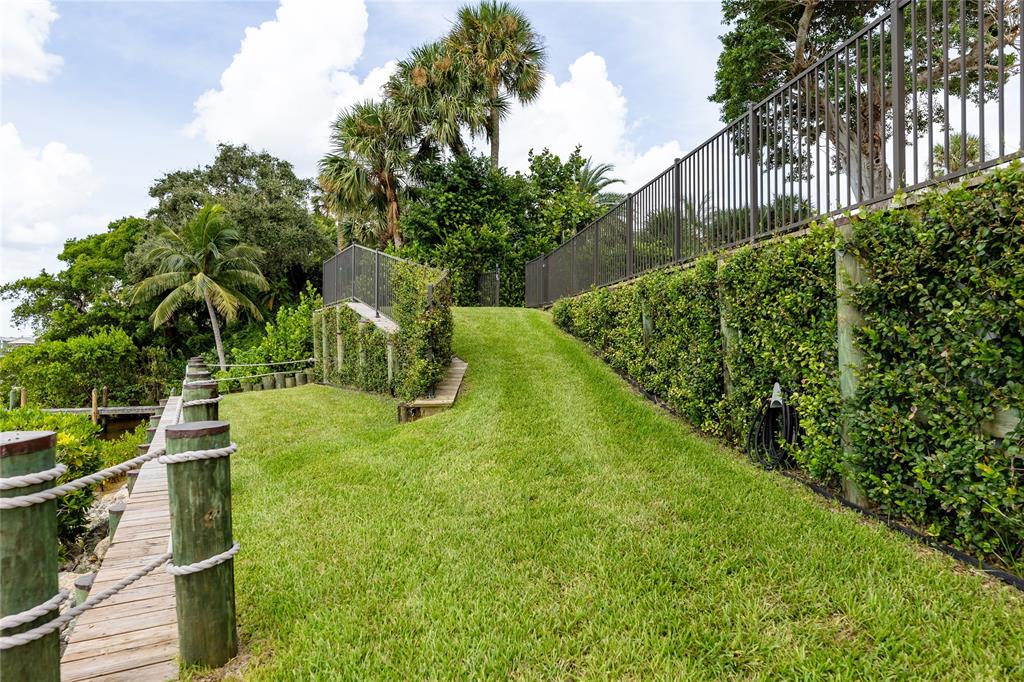9 North River Road Stuart, FL 34996 - Photo 13 of 75 a view of yard with green space