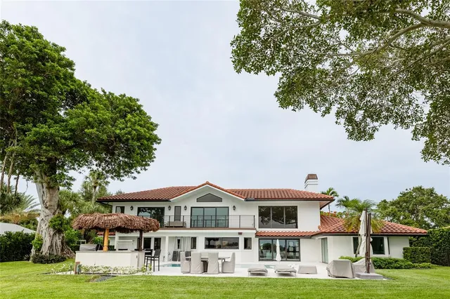a stove top oven sitting inside of a kitchen