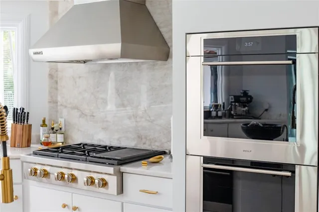 a view of a living room and entryway