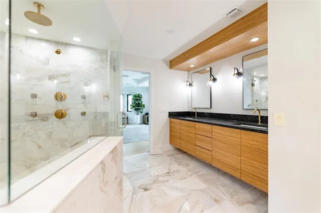 a view of a livingroom with workspace and a window