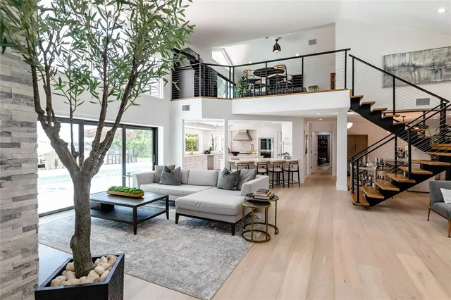 a bathroom with a sink a mirror and a shower