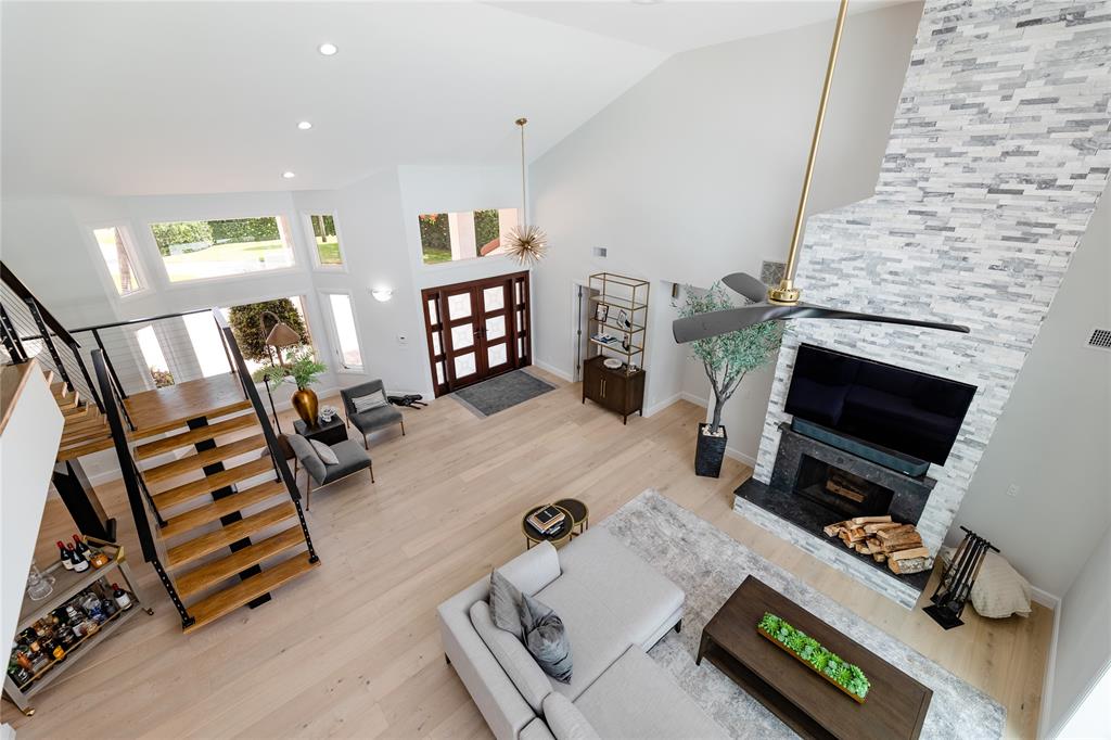 9 North River Road Stuart, FL 34996 - Photo 47 of 75 a living room with furniture and a fireplace