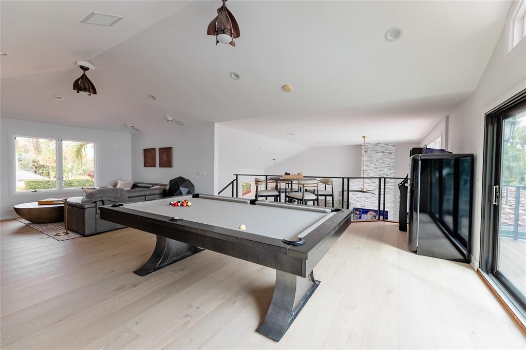 9 North River Road Stuart, FL 34996 - Photo 51 of 75 a living room with lots of furniture and a ceiling fan