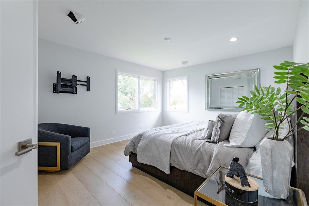 9 North River Road Stuart, FL 34996 - Photo 61 of 75 a bedroom with a bed and a window