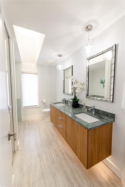 9 North River Road Stuart, FL 34996 - Photo 63 of 75 a spacious bathroom with a granite countertop sink mirror and a