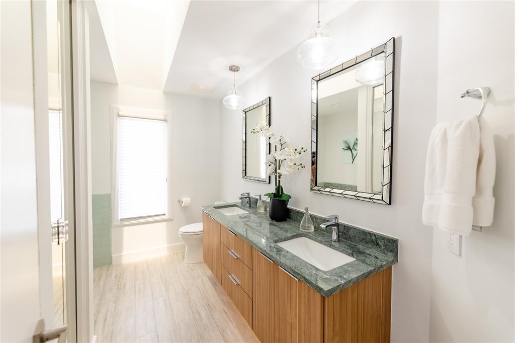 9 North River Road Stuart, FL 34996 - Photo 64 of 75 a bathroom with a sink a mirror and a shower