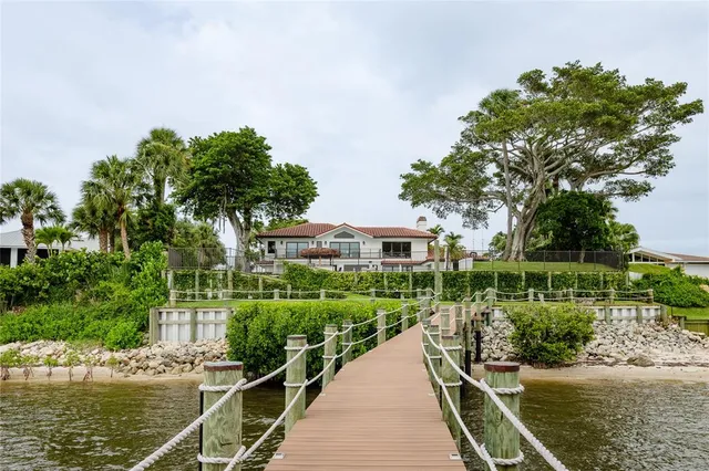 a view of a garden with an outdoor seating