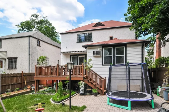 front view of a house with a small yard