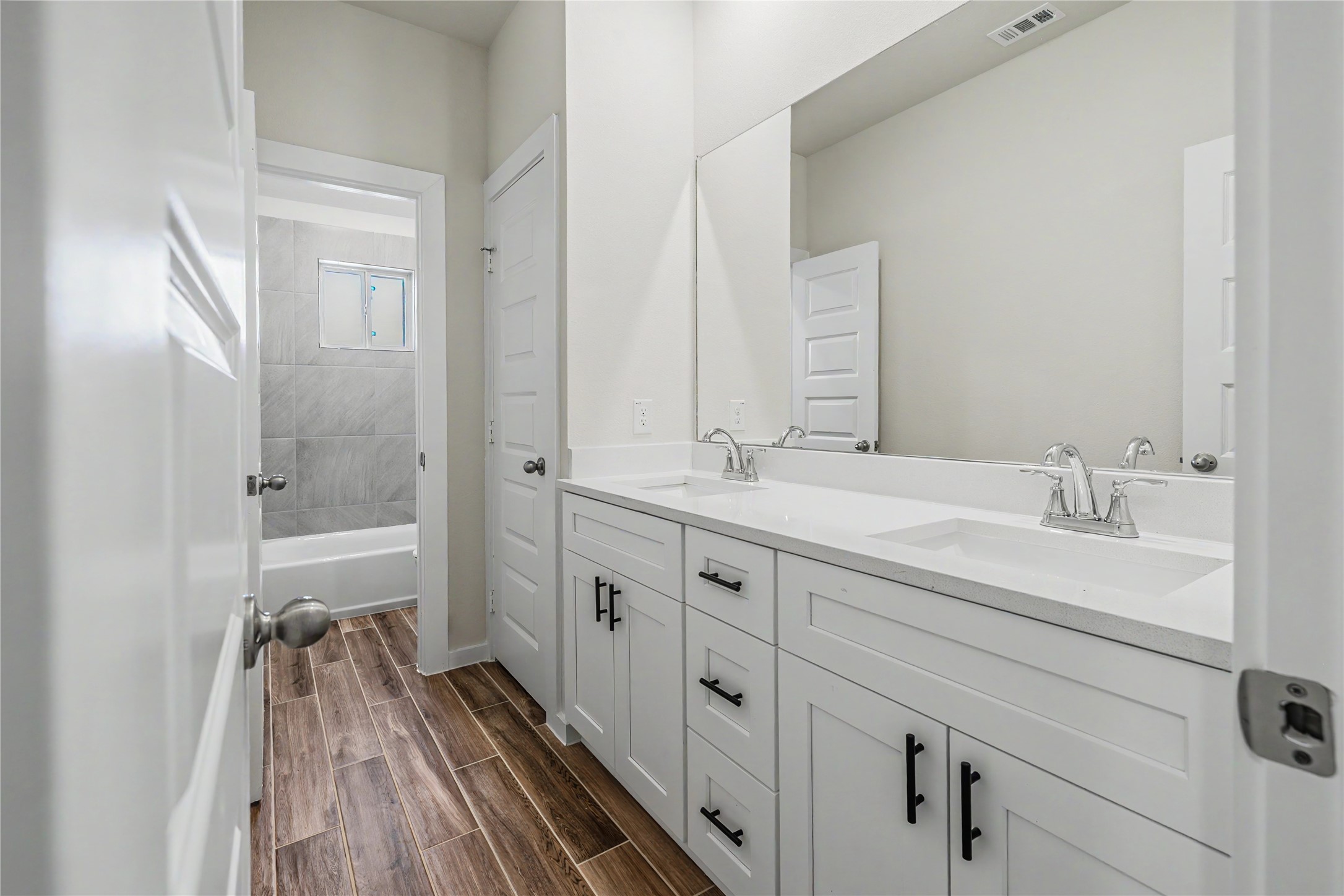 6427 Bolinas Court Rosharon, TX 77583 - Photo 34 of 49 a bathroom with a double vanity sink a toilet and shower