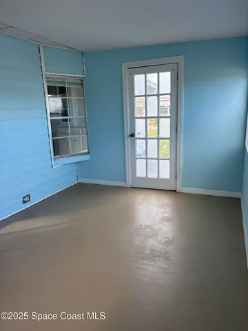 an empty room with a window