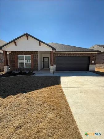 a front view of house with yard