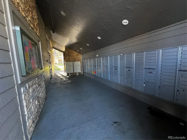 a view of an empty room with stairs