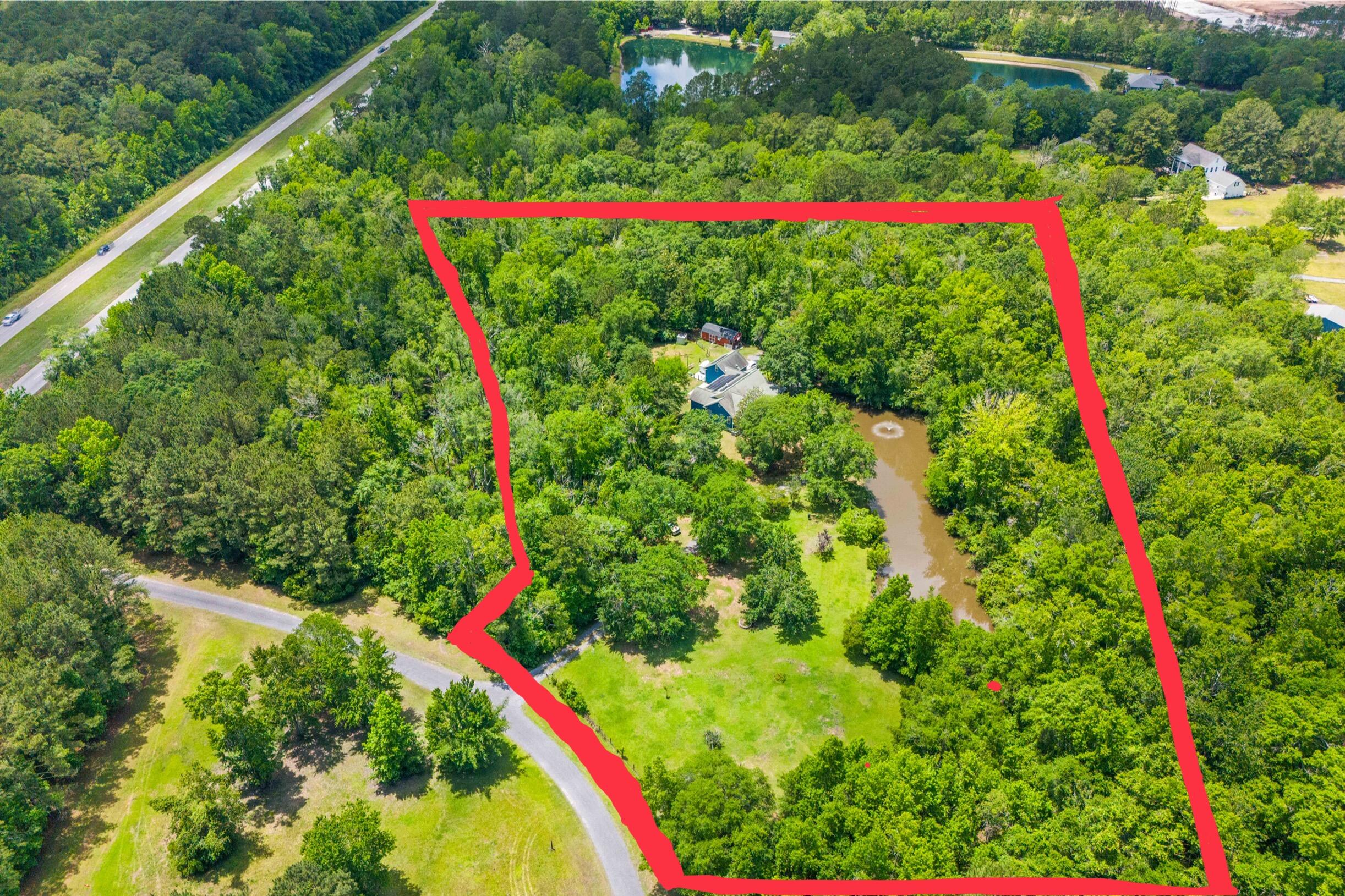 6035 Bay Pond Road Ravenel, SC 29470 - Photo 5 of 25 DJI_20250513133519_0081_D