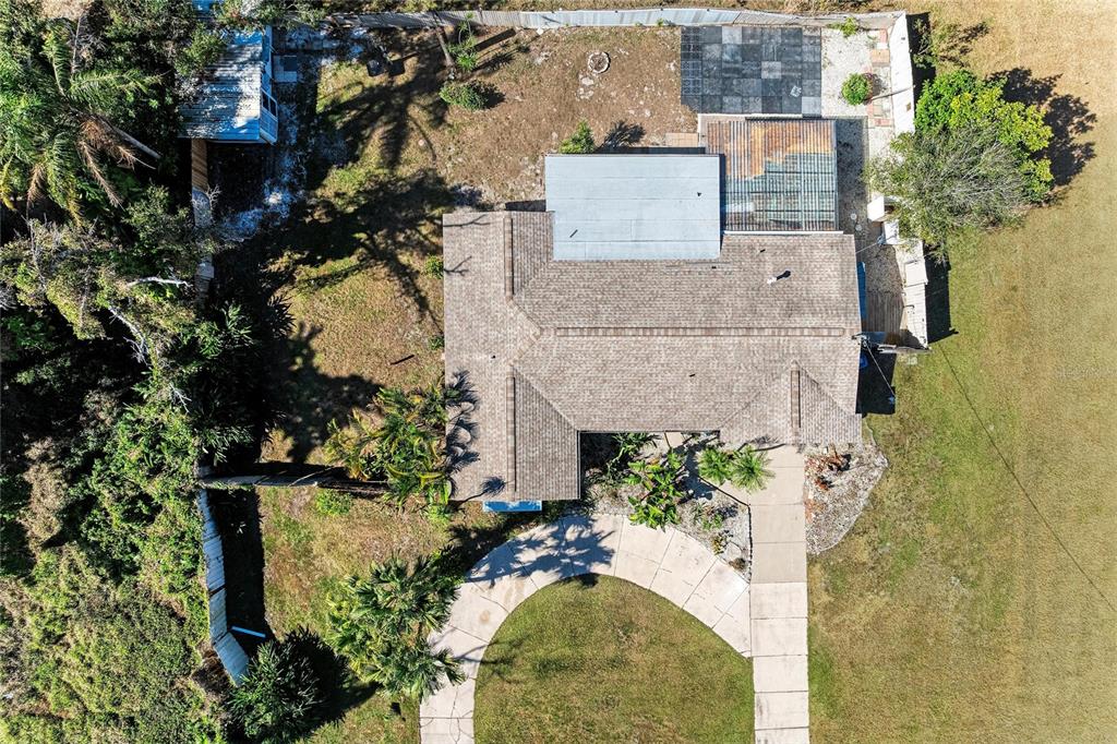 4010 South Lockwood Ridge Road Sarasota, FL 34231 - Photo 3 of 48 an aerial view of a house with a yard