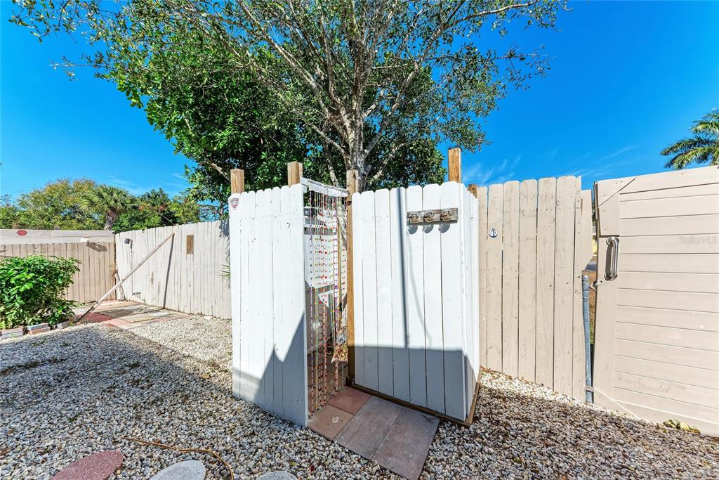 4010 South Lockwood Ridge Road Sarasota, FL 34231 - Photo 34 of 48 a view of a wooden fence