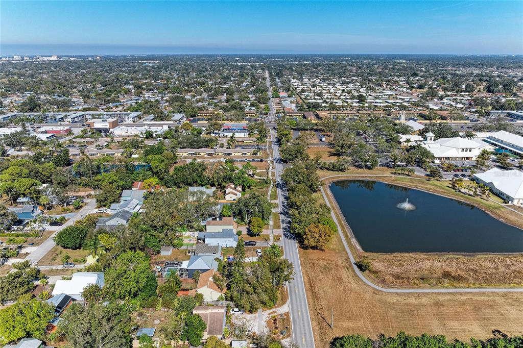 4010 South Lockwood Ridge Road Sarasota, FL 34231 - Photo 46 of 48 an aerial view of residential houses with outdoor space
