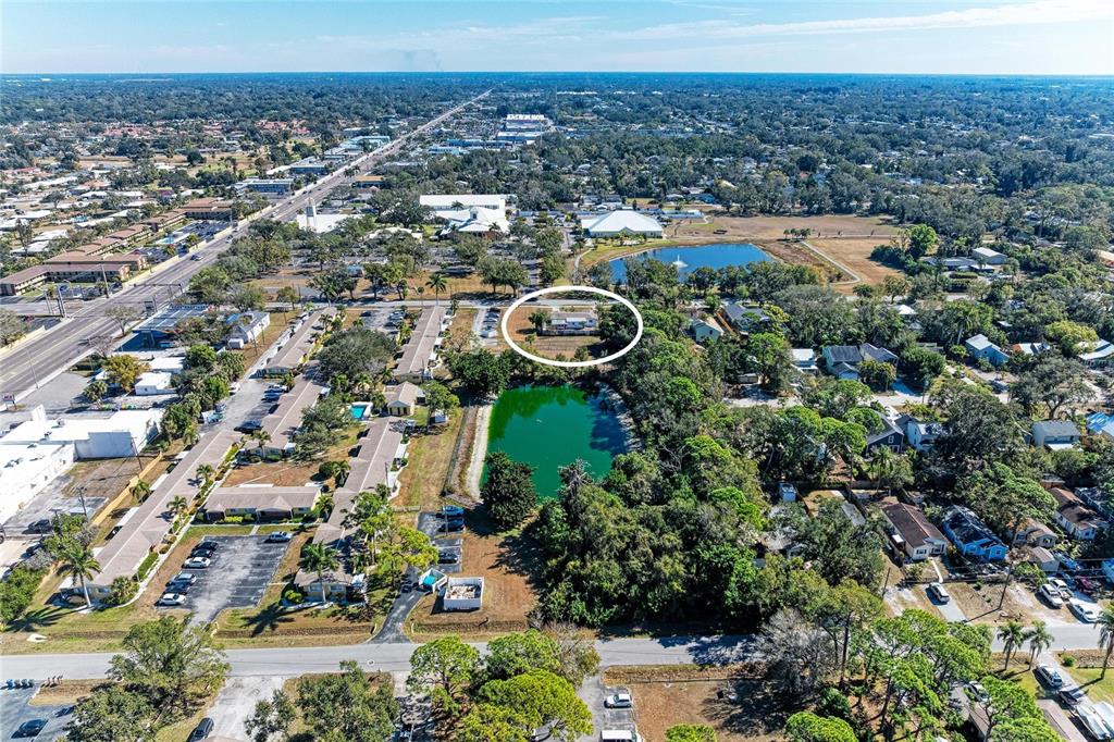 4010 South Lockwood Ridge Road Sarasota, FL 34231 - Photo 47 of 48 an aerial view of a residential houses with city view
