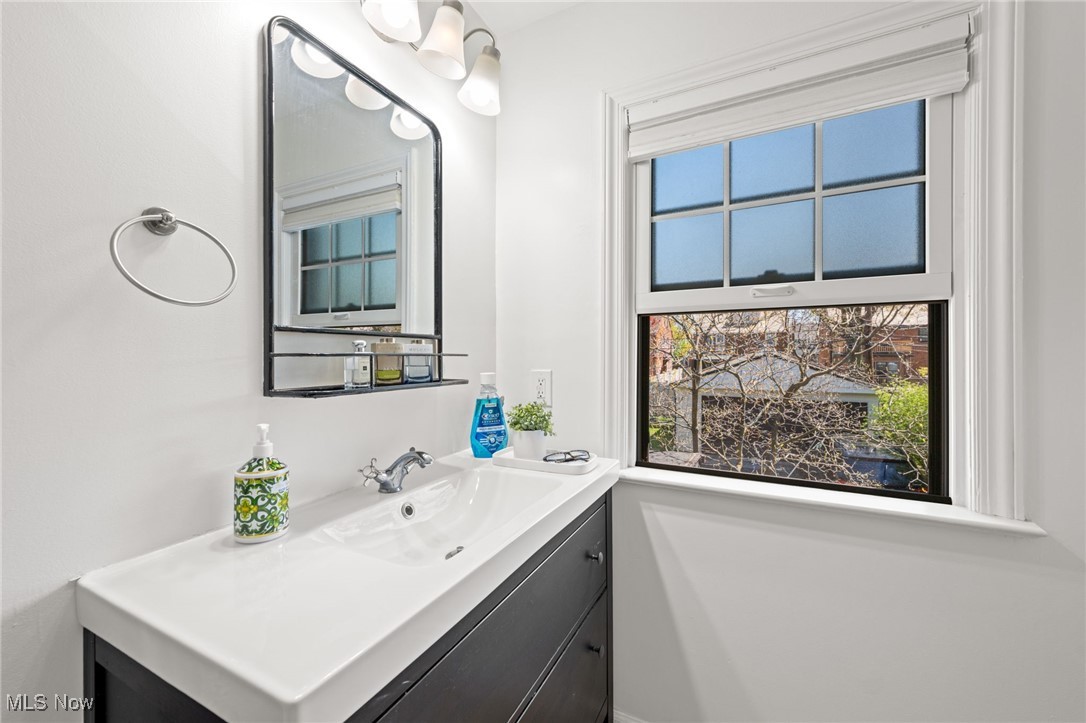 2471 Channing Road Cleveland, OH 44118 - Photo 22 of 33 Bathroom with a healthy amount of sunlight and vanity