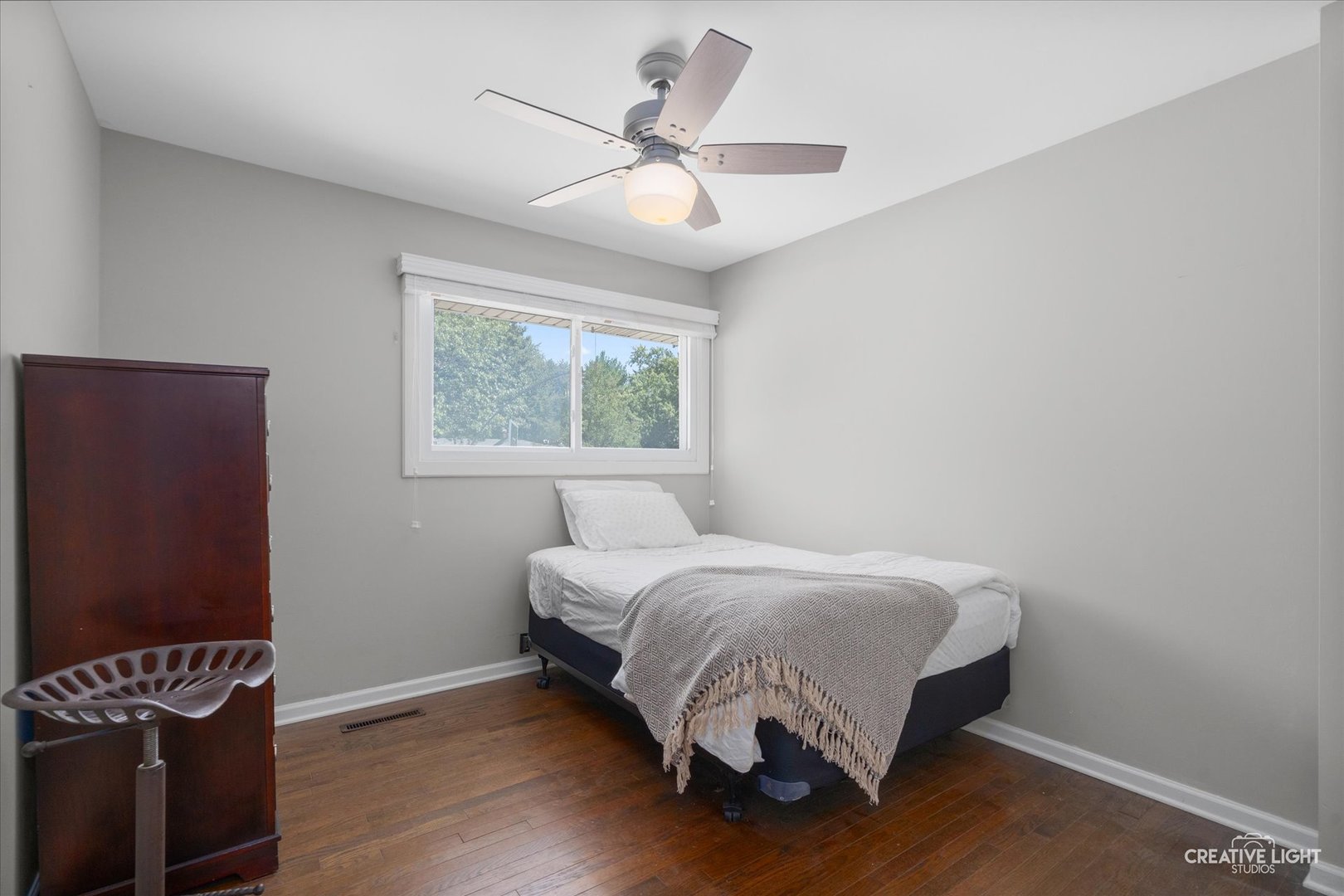 201 Pepperidge Road Naperville, IL 60540 - Photo 15 of 31 a bedroom with a bed and a window