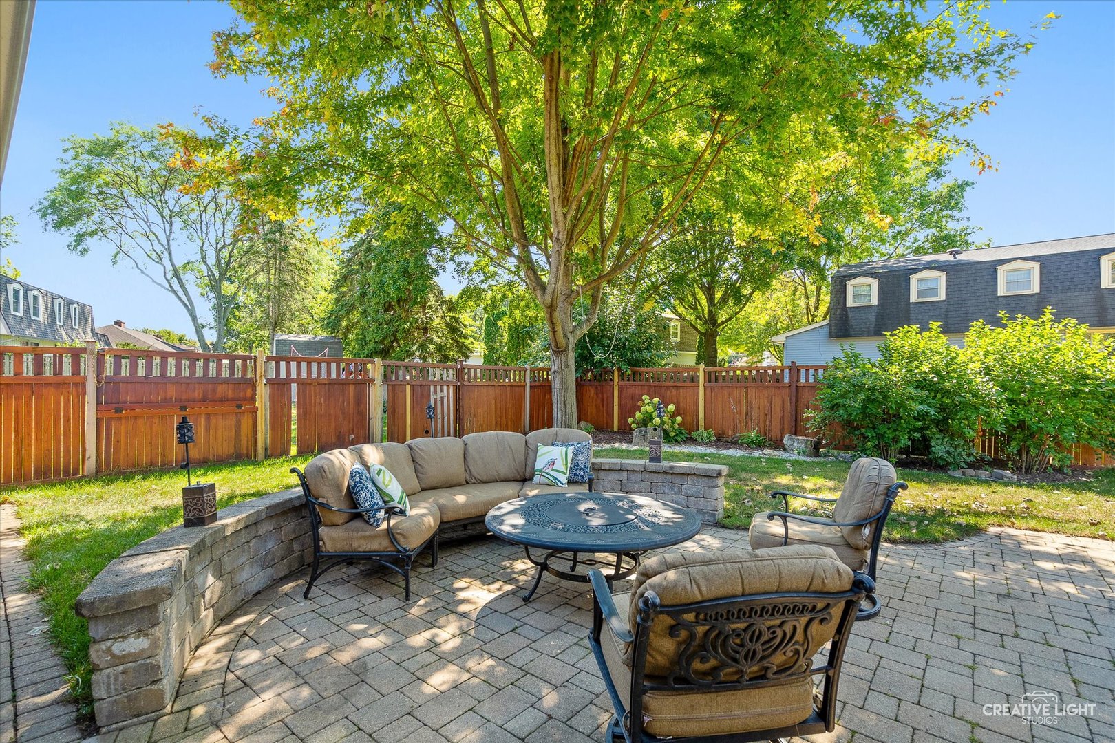 201 Pepperidge Road Naperville, IL 60540 - Photo 23 of 31 a backyard of a house with outdoor seating