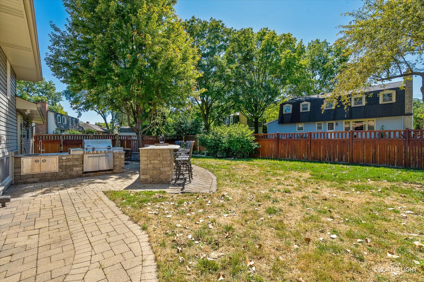 201 Pepperidge Road Naperville, IL 60540 - Photo 27 of 31 a view of a backyard with a garden