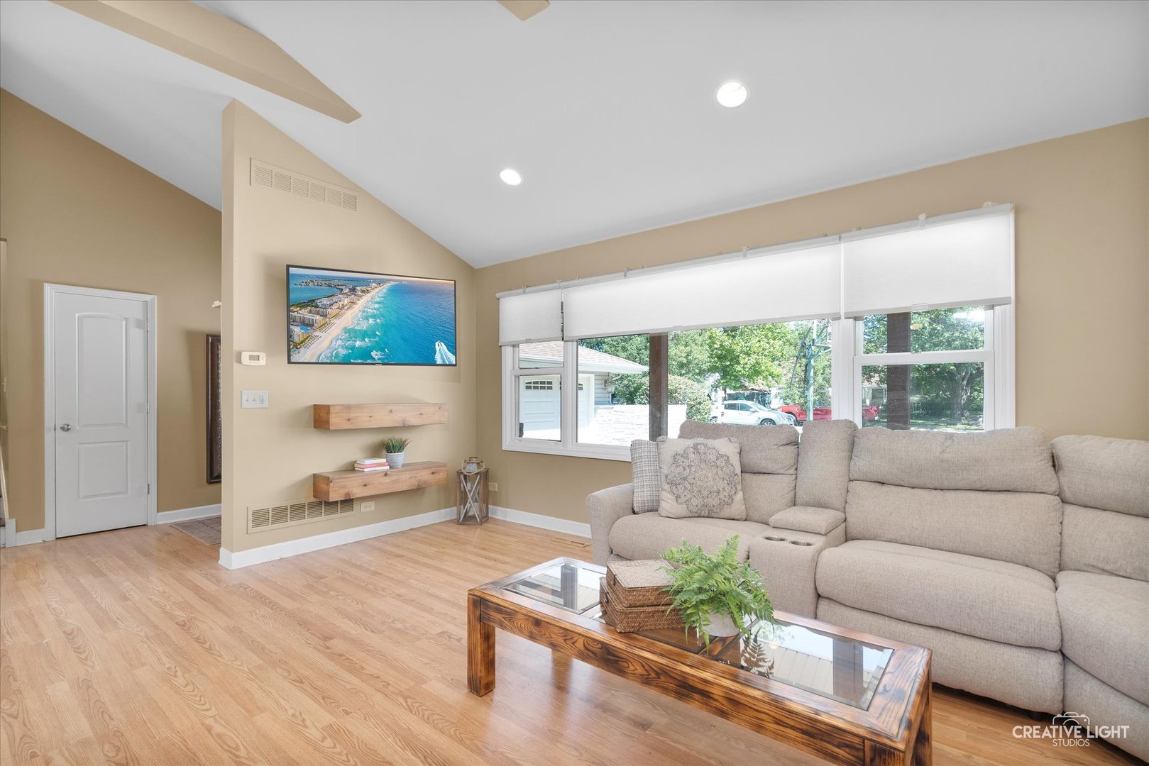 201 Pepperidge Road Naperville, IL 60540 - Photo 3 of 31 a living room with furniture and a large window