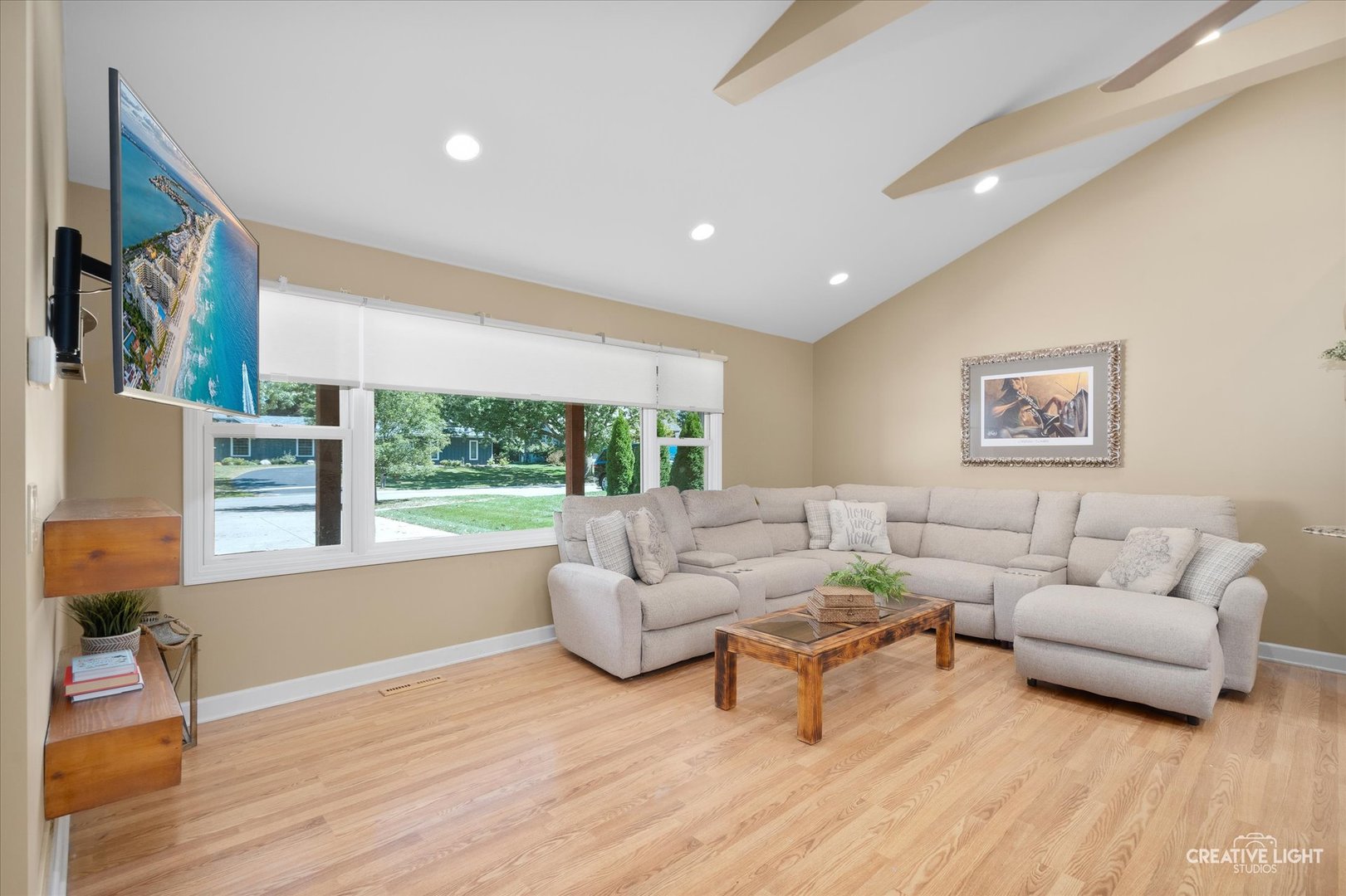 201 Pepperidge Road Naperville, IL 60540 - Photo 4 of 31 a living room with furniture and a large window