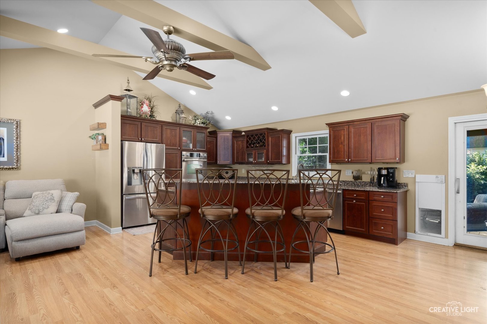 201 Pepperidge Road Naperville, IL 60540 - Photo 6 of 31 a living room with stainless steel appliances furniture and wooden floor