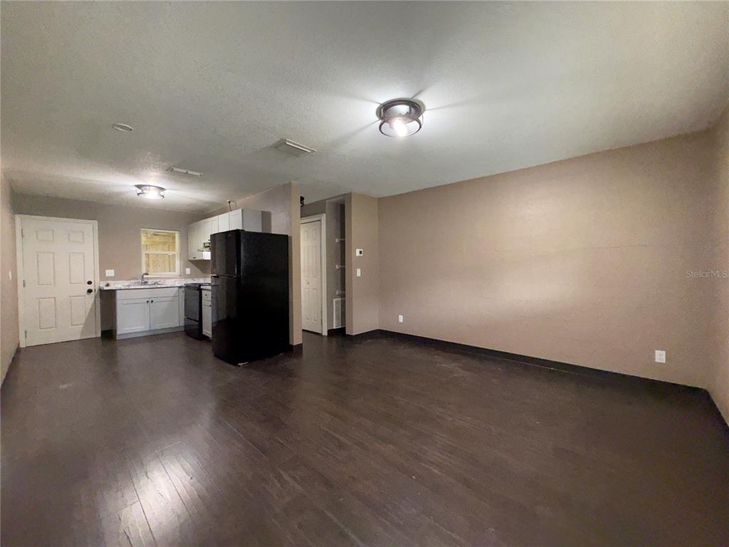 305 Marker Street Altamonte Springs, FL 32701 - Photo 5 of 15 a view of a livingroom with wooden floor