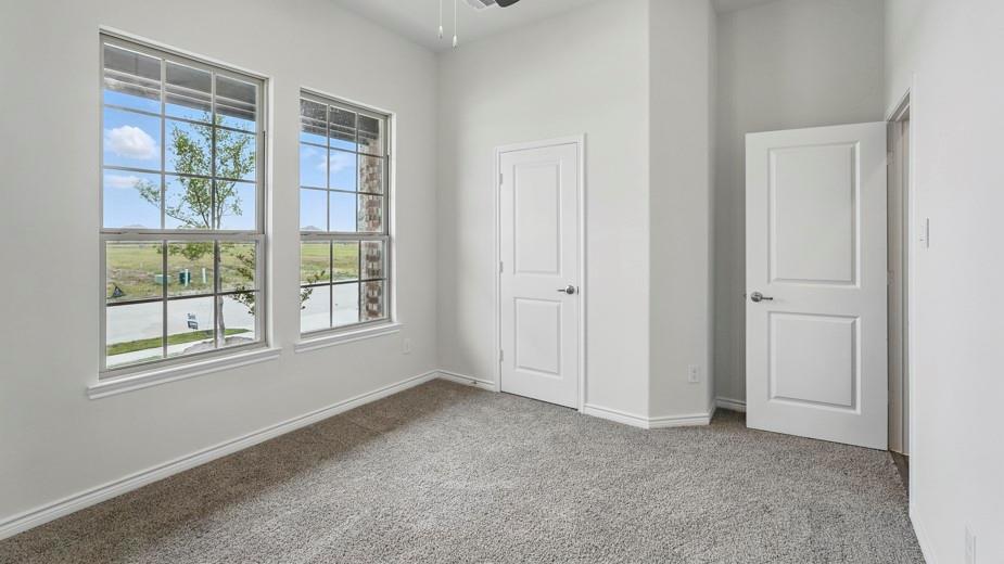 4187 Plateau Drive Forney, TX 75126 - Photo 34 of 36 an empty room with windows
