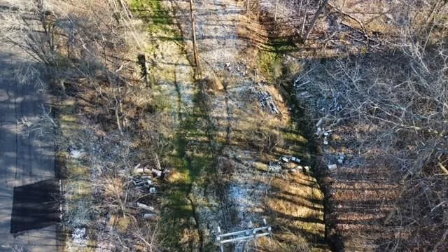 a aerial view of a house with a yard