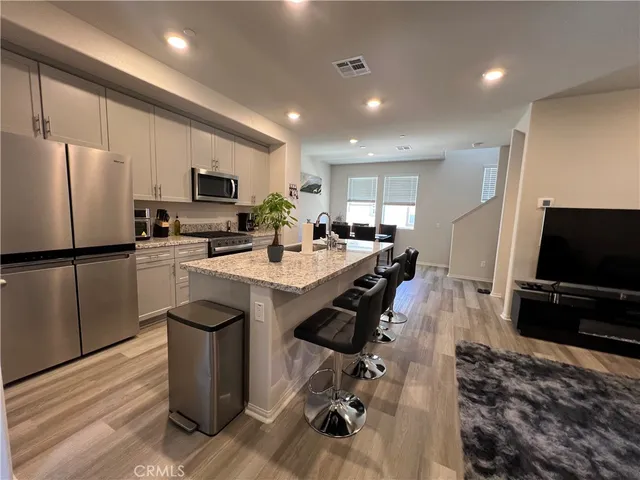 a kitchen with counter space cabinets and appliances
