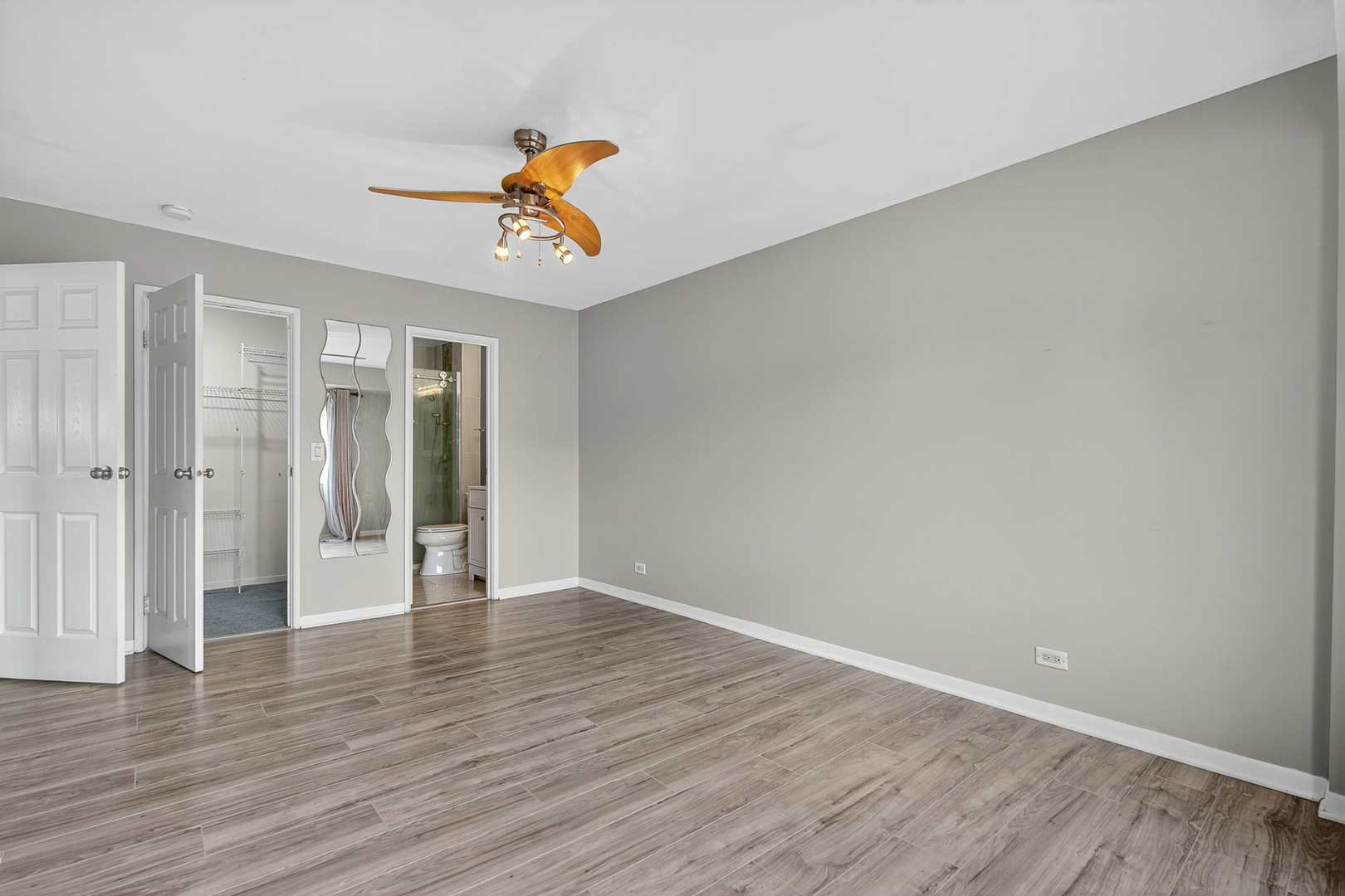 535 Jordan Way Bolingbrook, IL 60440 - Photo 19 of 35 a view of an empty room with wooden floor