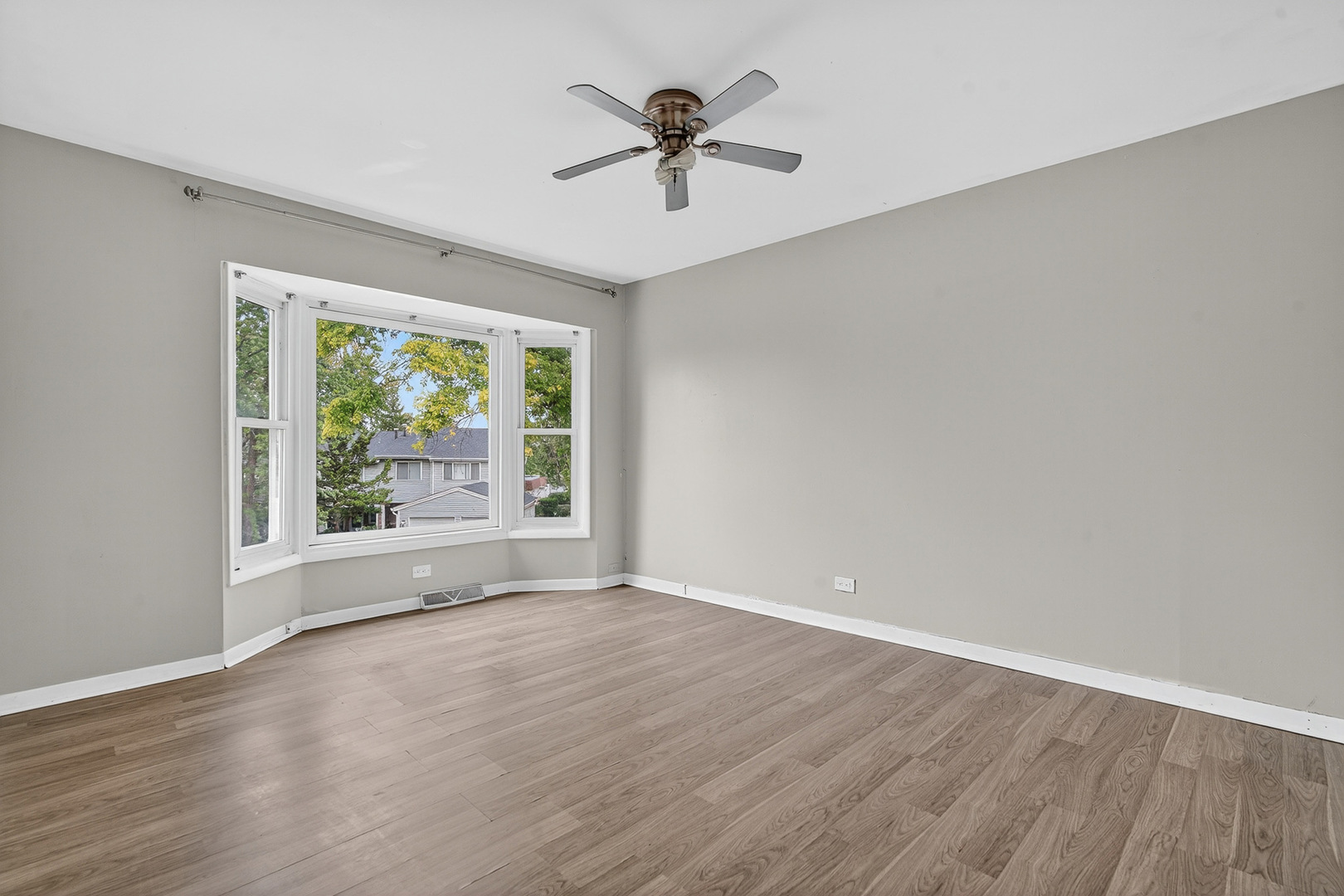 535 Jordan Way Bolingbrook, IL 60440 - Photo 24 of 35 wooden floor in an empty room with a window