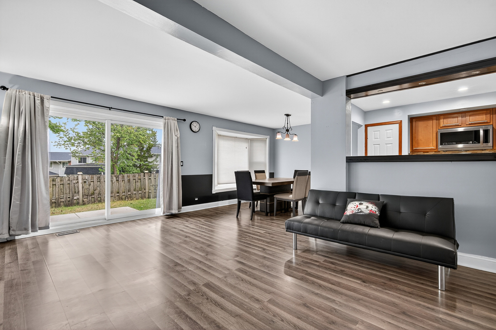 535 Jordan Way Bolingbrook, IL 60440 - Photo 9 of 35 a living room with furniture and large windows