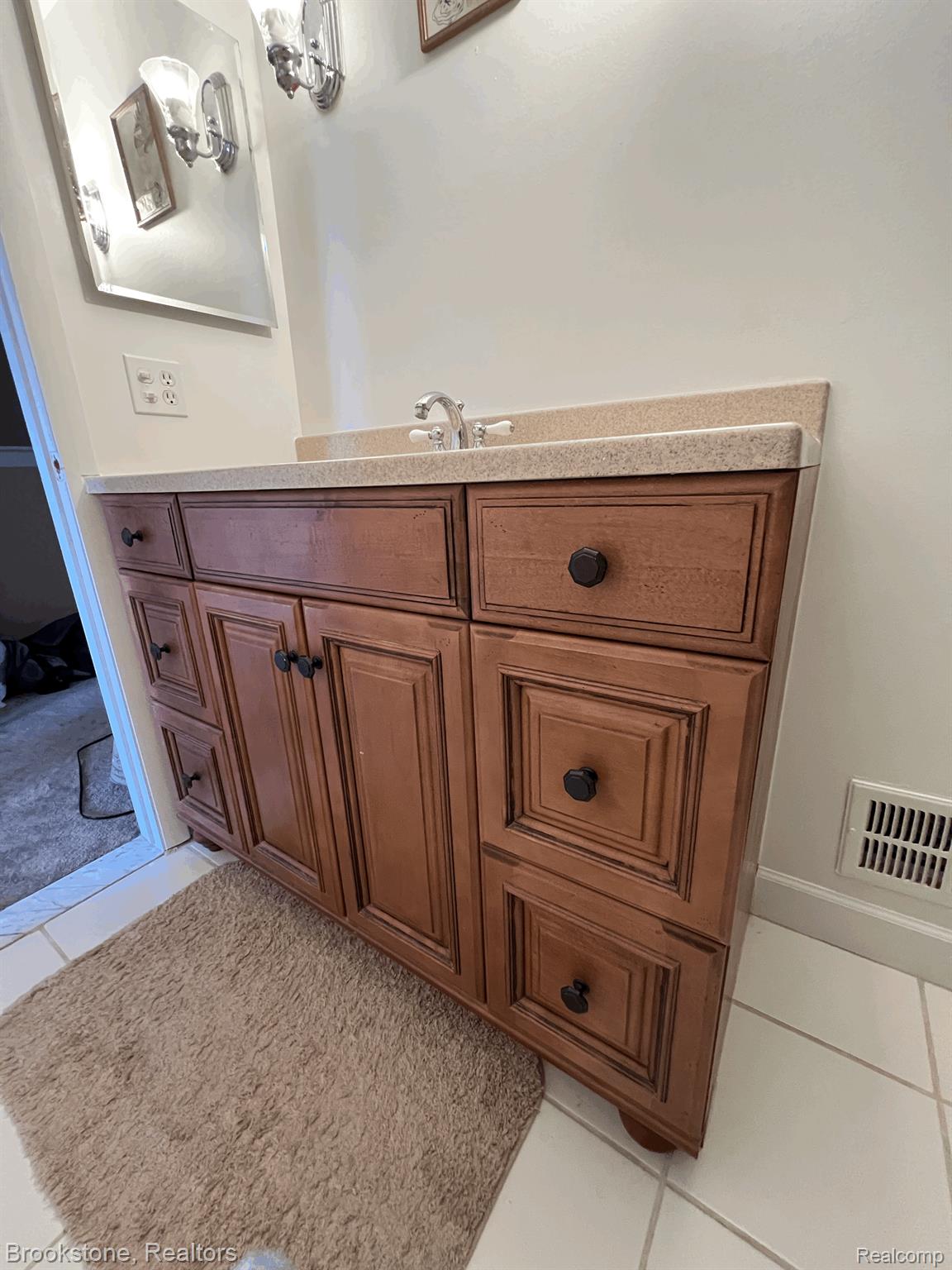6721 Andersonville Road, Unit 41 Clarkston, MI 48346 - Photo 23 of 32 MAIN BATH. UPDATED CABINET AND CERAMIC TILE