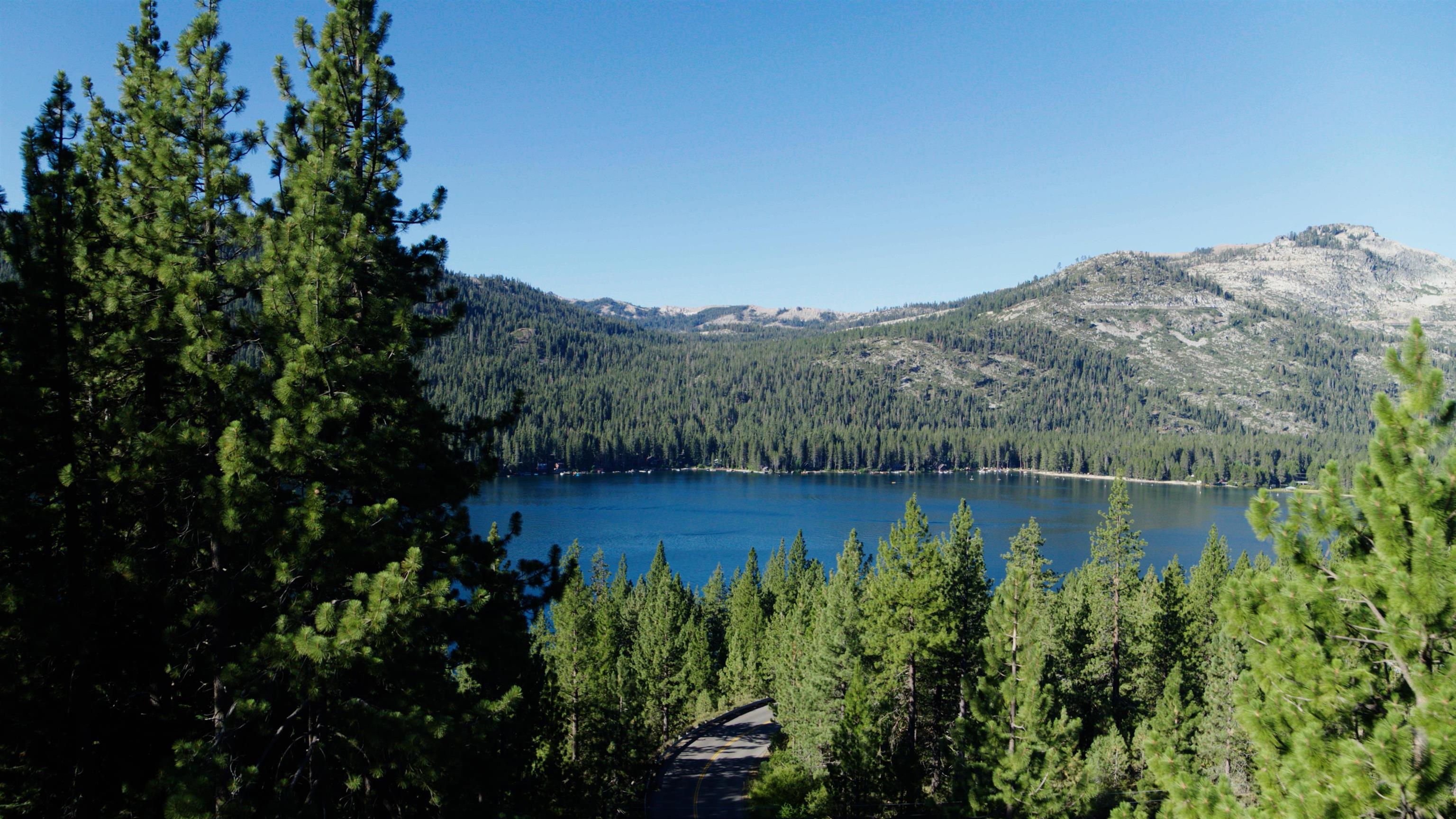 10575 Donner Lake Road Truckee, CA 96161 - Photo 4 of 6 a view of a lake with a mountain in the background