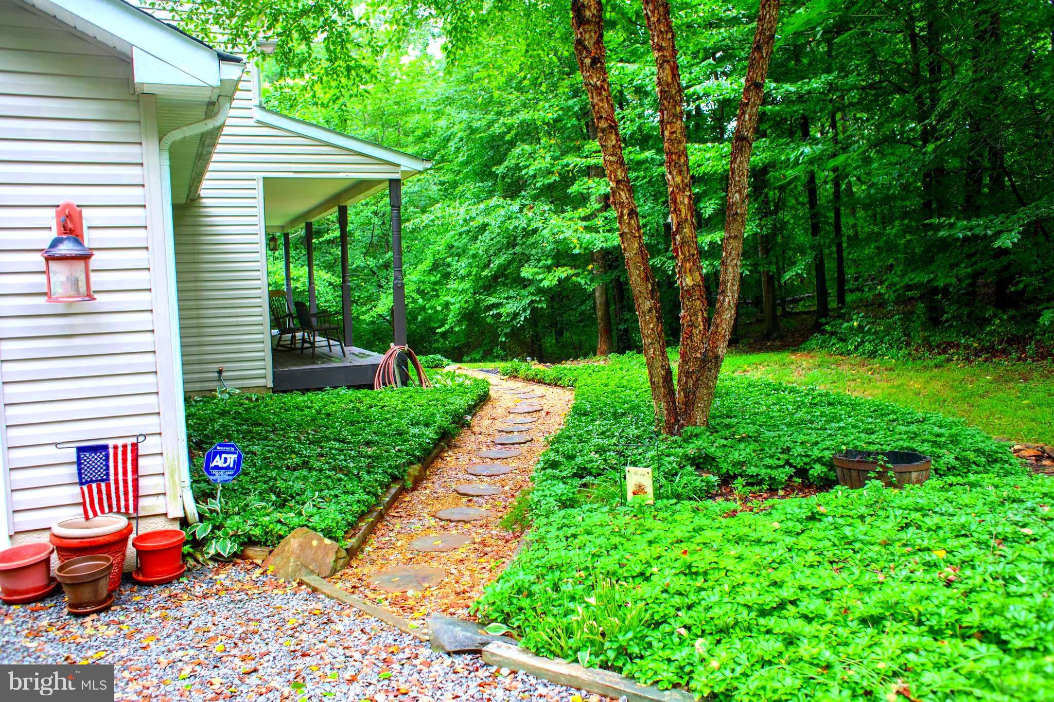 9369 Springs Road Warrenton, VA 20186 - Photo 20 of 25 Path to front porch through landscaped yard