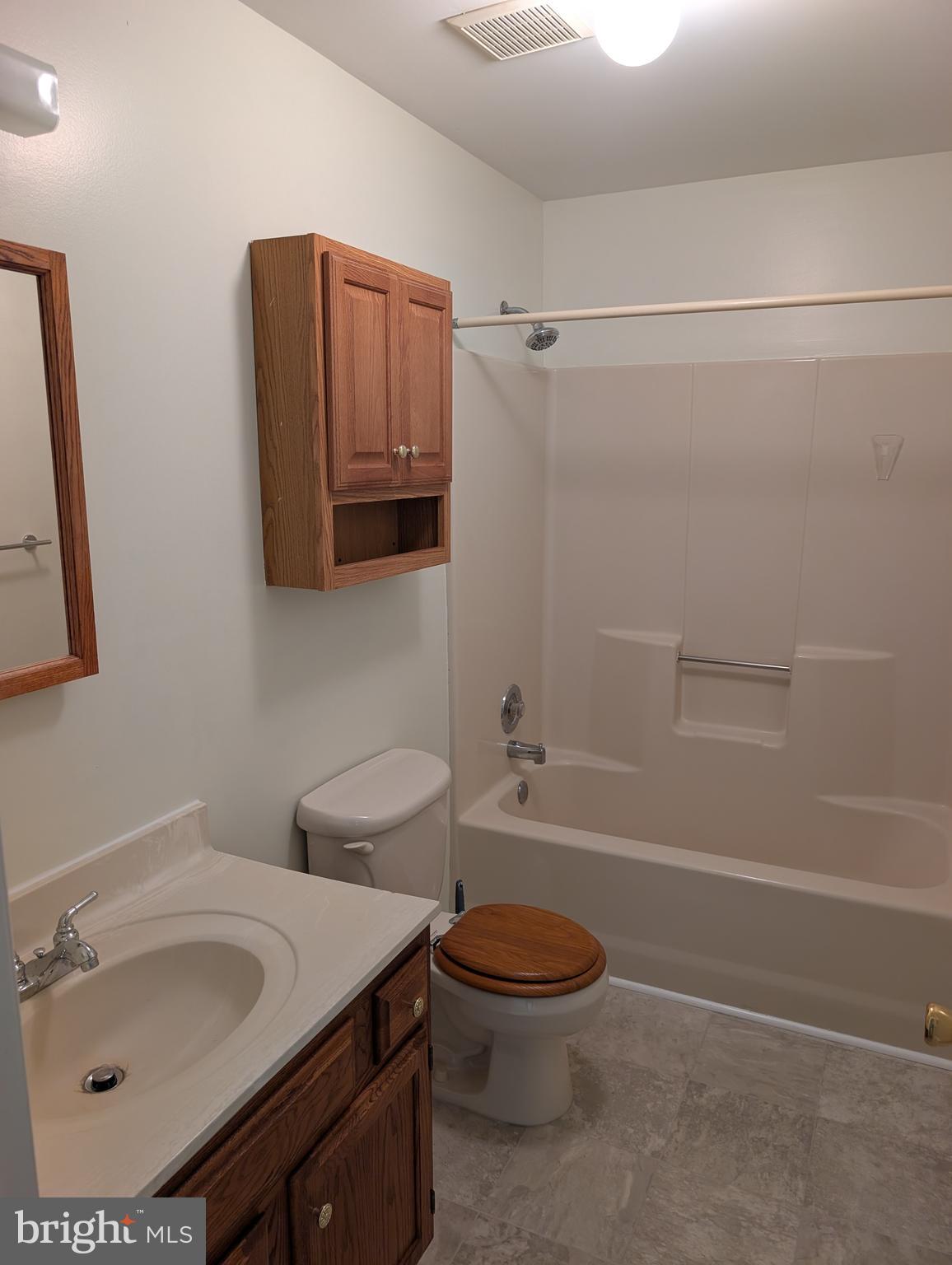 131 Farrell Lane Fredericksburg, VA 22401 - Photo 16 of 22 a bathroom with a sink a toilet and shower