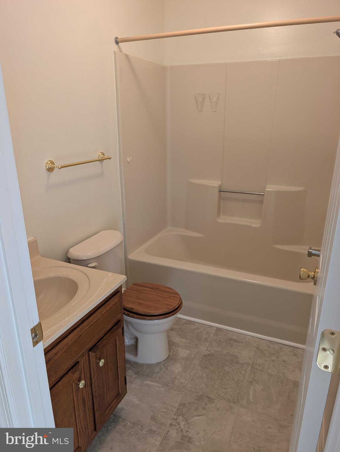 131 Farrell Lane Fredericksburg, VA 22401 - Photo 18 of 22 a bathroom with a granite countertop sink toilet and shower