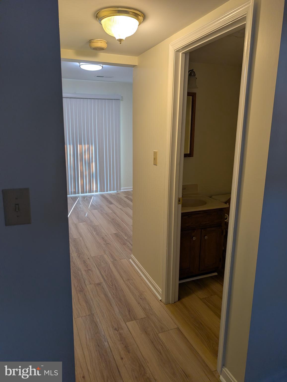 131 Farrell Lane Fredericksburg, VA 22401 - Photo 5 of 22 a view of hallway with wooden floor