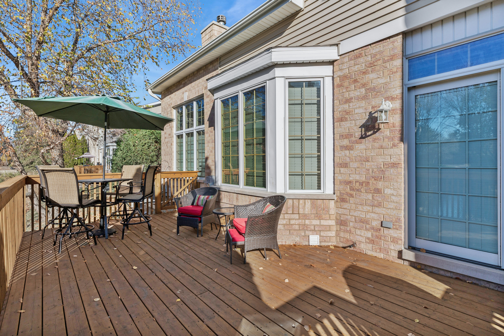 1738 Park Ridge Point Park Ridge, IL 60068 - Photo 22 of 27 a balcony with wooden floor table and chairs