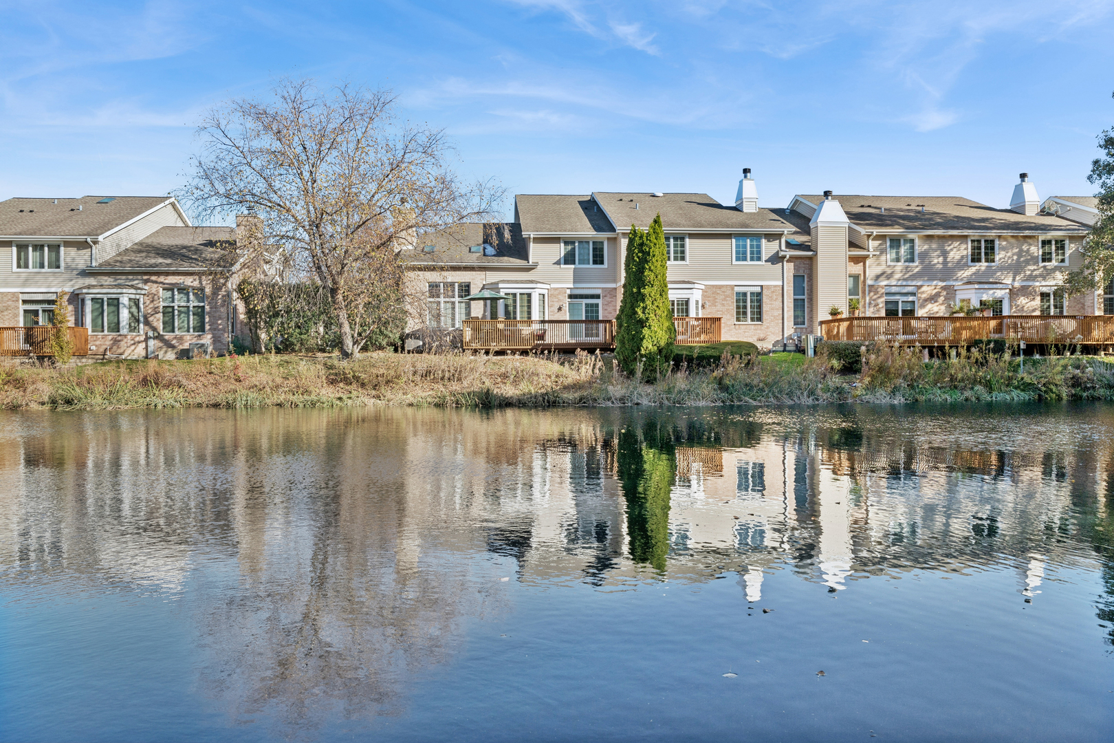 1738 Park Ridge Point Park Ridge, IL 60068 - Photo 24 of 27 a view of a lake with a building next to a lake
